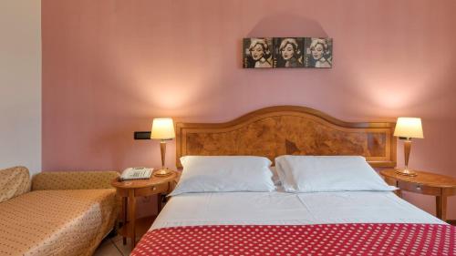 Katil atau katil-katil dalam bilik di Primotel Brescia