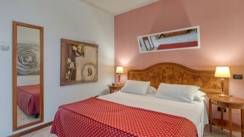 Katil atau katil-katil dalam bilik di Primotel Brescia