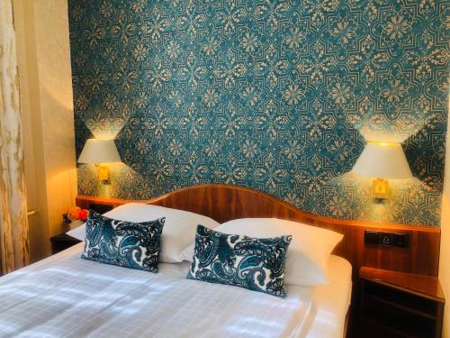 Postelja oz. postelje v sobi nastanitve Boutiquehotel Oberkirch im Zentrum