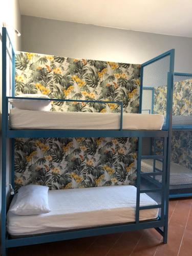 Postel nebo postele na pokoji v ubytování H Hostel Friendly Accommodation