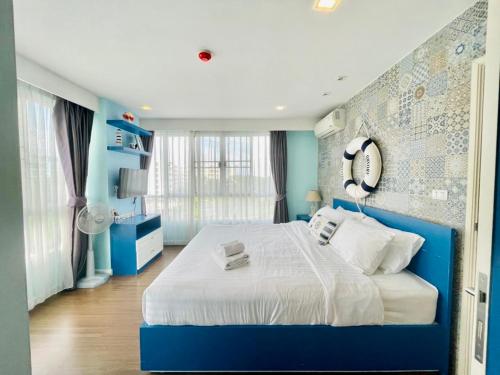 Postel nebo postele na pokoji v ubytování Baan Imm Aim Huahin sea view
