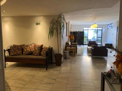 Posezení v ubytování San Phillip Flat Hotel