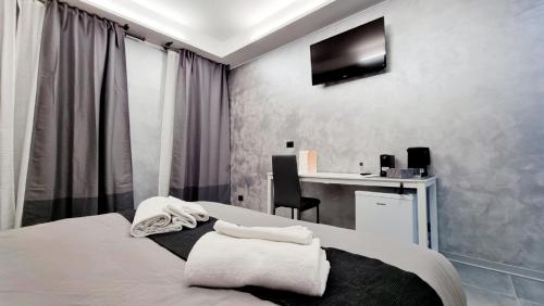 Postel nebo postele na pokoji v ubytování Residenza Vittorio 57