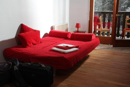 Katil atau katil-katil dalam bilik di Appartement Adélaïde