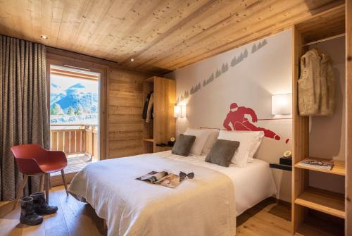 Postel nebo postele na pokoji v ubytování Chalet Hôtelier LES EQUINOXES - VAL D'ISERE