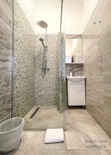 a bathroom with a shower and a sink at Vacation Rentals Croatia in Split