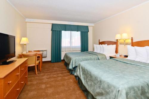 صورة لـ Magnuson Grand Pioneer Inn and Suites في إسكانابا