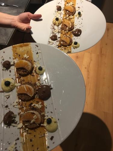 two white plates of food on a table at Hôtel Logis Restaurant La Fontaine in Mantry