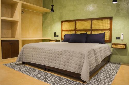 Apartamentos Dsiena Valladolid tesisinde bir odada yatak veya yataklar