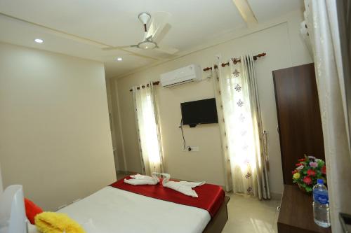 Tempat tidur dalam kamar di Hotel Innate Inn