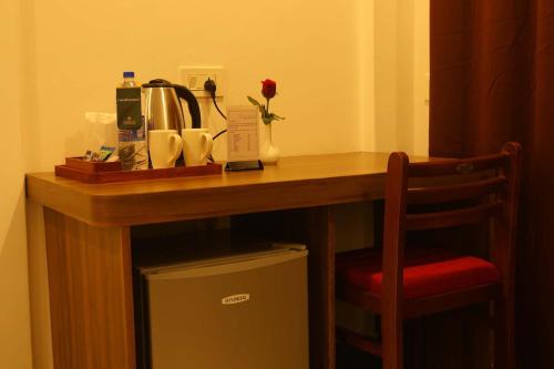 MattanūrにあるHOTEL LA SERENE Mattannurのギャラリーの写真