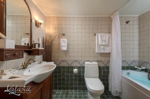 A bathroom at Panthea Valasia Boutique Villa