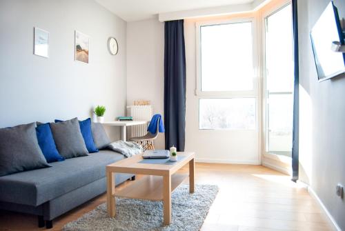 Posedenie v ubytovaní Mogilska Tauron Arena Two Bedroom Apartment