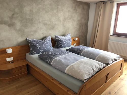 Postel nebo postele na pokoji v ubytování Haus Baumoos