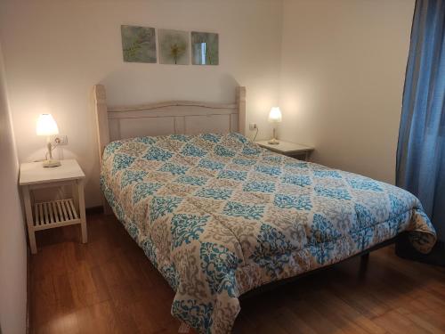 Postel nebo postele na pokoji v ubytování Palma Tellus