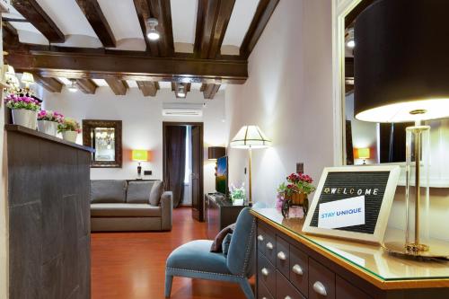 Posteľ alebo postele v izbe v ubytovaní Stay U-nique Apartments Carretes