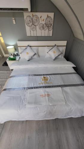 Postel nebo postele na pokoji v ubytování The Dunes Camping & Safari RAK