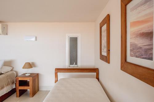 Katil atau katil-katil dalam bilik di Mata Hari Apartamentos