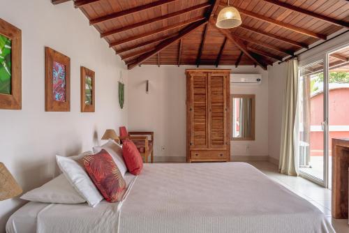 Katil atau katil-katil dalam bilik di Mata Hari Apartamentos