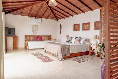 Katil atau katil-katil dalam bilik di Mata Hari Apartamentos
