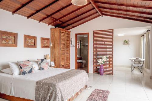 Katil atau katil-katil dalam bilik di Mata Hari Apartamentos
