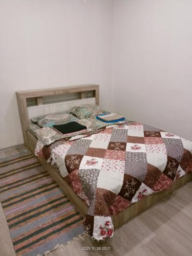 Cama ou camas em um quarto em Apartment Аэропорт Иркутска