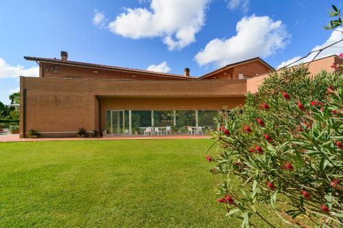 Κήπος έξω από το Residence San Rossore