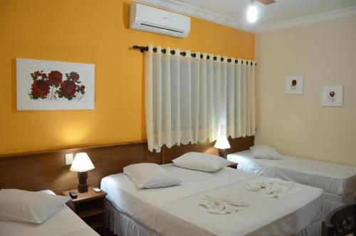 Hotel São Marcos Orlândia SPにあるベッド