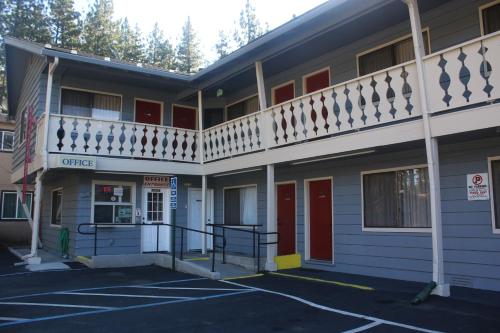 an empty parking lot in front of a building at Thunderchief Inn in South Lake Tahoe