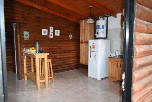Η κουζίνα ή μικρή κουζίνα στο Rincon del lago