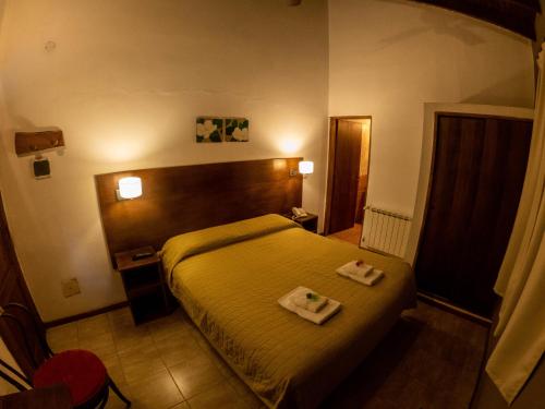 Posada del Virrey tesisinde bir odada yatak veya yataklar