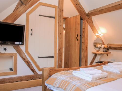 Postel nebo postele na pokoji v ubytování The Turnip House