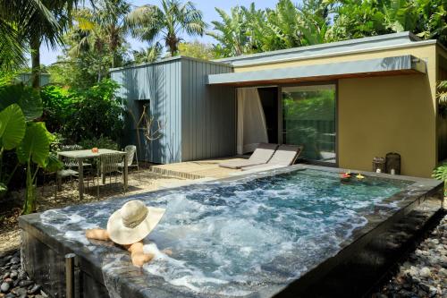 a pool in the backyard of a house at Donna Carmela Resort & Lodges in Riposto