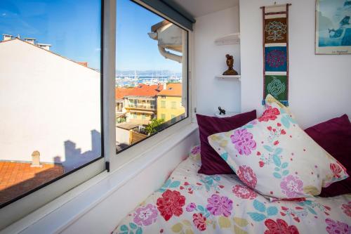 Penthouse Antibes apartment tesisinde bir odada yatak veya yataklar