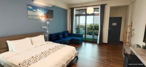 Cama o camas de una habitación en 嚨口十二之一民宿Longcall 12-1