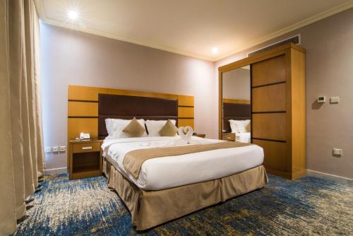 Postel nebo postele na pokoji v ubytování Ozone hotel