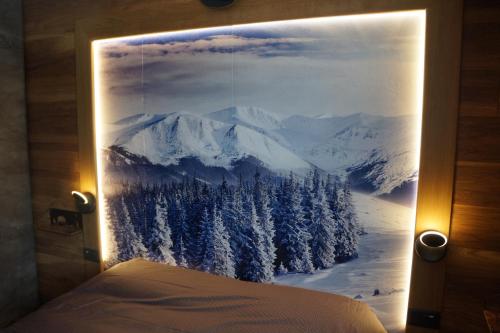 a picture of a mountain with snow on it at ROYAL SUITE TOTTO'NETTA 504 in Passo del Tonale