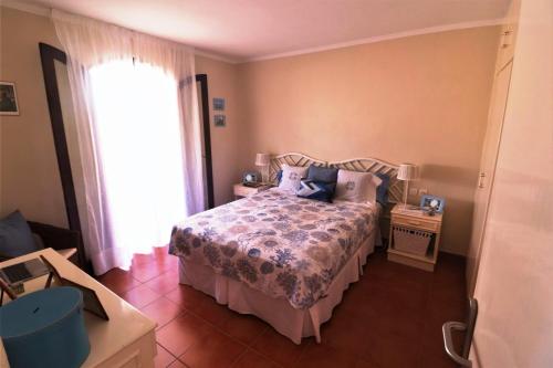 A bed or beds in a room at Apartment with large relax terrace and top equipment