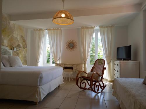 Ένα ή περισσότερα κρεβάτια σε δωμάτιο στο Hôtel Restaurant Notre Dame