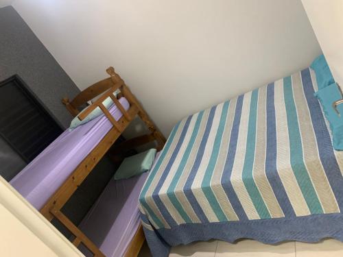 Postel nebo postele na pokoji v ubytování Casa de Temporada do Spa
