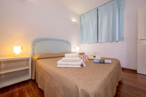 Кровать или кровати в номере Chiesetta Suite