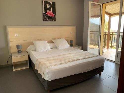 Ліжко або ліжка в номері Les Asphodèles