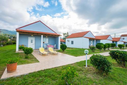 a view of a house with a patio at Beachside Bungalows Acharavi Corfu in Acharavi