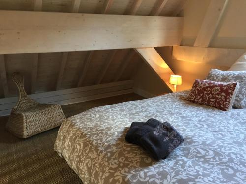 Postel nebo postele na pokoji v ubytování Le Clos de Jabanelle