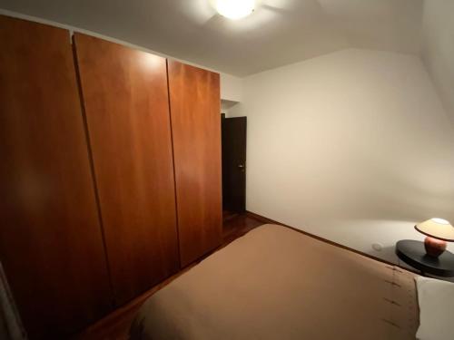 Posteľ alebo postele v izbe v ubytovaní Centralissimo appartamento a Sauze D Oulx