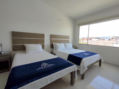 Postel nebo postele na pokoji v ubytování Hotel Boutique San Rafael