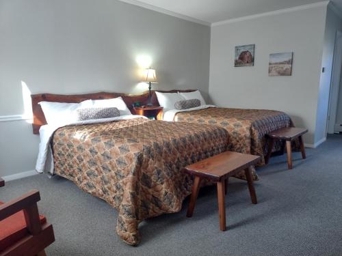 Ένα ή περισσότερα κρεβάτια σε δωμάτιο στο The Lodge at West River