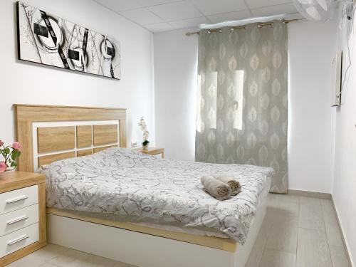 Postel nebo postele na pokoji v ubytování Casa Sergio de Novelda