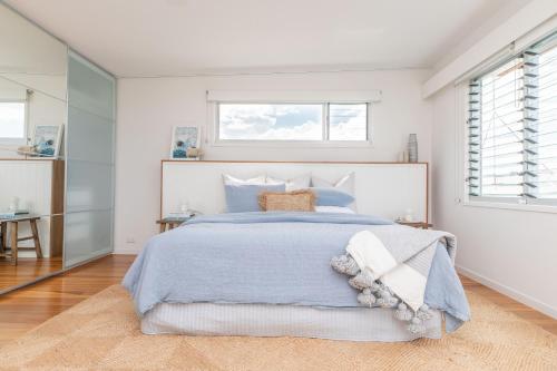 Postel nebo postele na pokoji v ubytování Akoakoa - Sunrise Beach