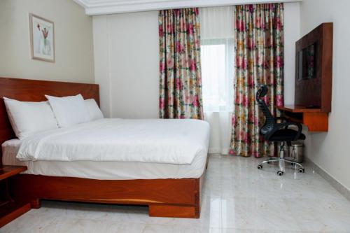Postel nebo postele na pokoji v ubytování El Doria Hotel